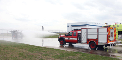 (3) The Stinger, built by Oshkosh on a Ford F-550 chassis that meets FAA Class 1 and 2 airport standards, can carry up to 300 gallons of water, a foam tank, up to 500 pounds of dry chem, and 120 pounds of halogenated agent.