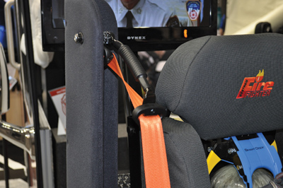 (1) Ready Reach is a device that brings the shoulder strap from behind the seat to the side of the seat.