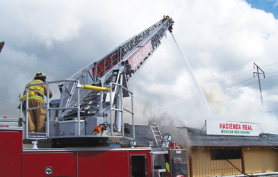 (1) Central Pierce (WA) Fire & Rescue put its new Pierce Manufacturing Arrow XT aerial ladder in service and within five minutes it was dispatched to a structure fire call where the vehicle pumped 27,000 gallons of water through its aerial waterway.