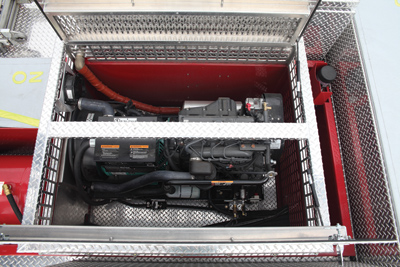 (4) Pierce installed its IRT APU, which automatically turns off the idling main chassis engine after 10 minutes if it is not being used for water flow or to operate the aerial and runs all the electrical elements on the vehicle in its place.