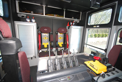 (2) Herbertsville's rescue is built on a Spartan Metro Star ELFD chassis with a 20-inch raised-roof cab. The cab is set up to seat six (four in the crew cab area) and includes two storage cabinets accessible from both inside and outside the cab.