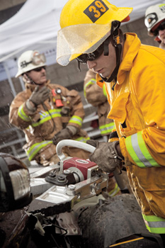 (3) A firefighter uses this Champion Spreading tool on a late-model Volvo.