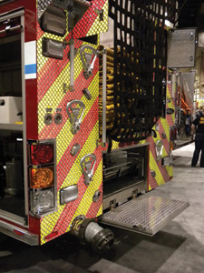 (2) There is no rear step or bumper on this rig. The rear drop-down door serves as the lowest access step. When the step is in the stowed position, the five-inch connection followed by the rear body panel will take the first hits in an accident.