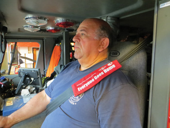 (4) This is what the sleeve looks like when attached to a seat belt. Seat belt sleeves can be stenciled with a safety slogan or company logo. Keep it simple with a professional look. The intent is to get firefighters to wear their seat belts, not be an advertisement for the local pizza parlor.