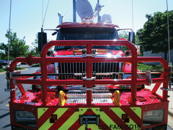 (2) Squad 16 has a 2,000-pound ¾-inch steel plate front bumper assembly that has two receivers for a 10,000-pound (1,000-pound workable load) 120-VAC electric rope rescue Amkus winch. In addition, the front bumper assembly has a 16,500-pound 12-VDC electric steel cable Warn winch and two primary tow hooks rated at 30,000 pounds each.