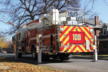 This KME 109-foot AerialCat ladder uses four H-style outriggers and is shown short jacked