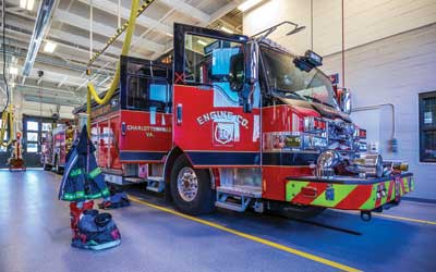 1 Charlottesville (VA) Fire Department (CFD) Engine Company 10 is ready for response in its new home. All utility support comes from overhead for all vehicles.