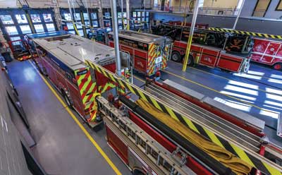 2 This overhead view shows the front side of the station. From left to right are Engine 10, Engine 1 visiting, Tower 10, and HazMat 1 with its trailer