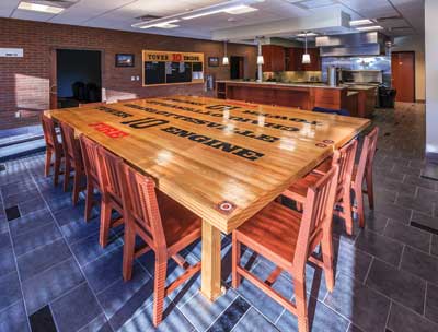 5 This is the dining room and kitchen area. CFD firefighters designed and built the tables and bulletin board.