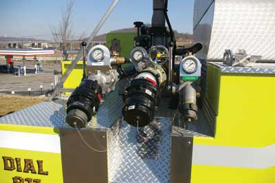 4 The rear of the Bromley foam truck is set up with two discharges: a five- and three-inch. It also has dual intakes-one for static and one for pumped foam.