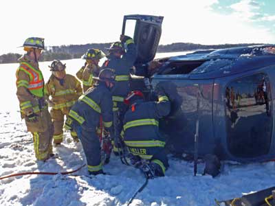 1 Two common cold-weather issues affecting hydraulic rescue tools are transporting the tools from the apparatus to the vehicle, which is often off the roadway, and oil viscosity issues (thickening), which cause the tools to operate more slowly. Consider having a way to mount tools to a backboard or Stokes so you can lower them with a rope to a vehicle's location. For viscosity issues, there isn't a lot departments can do short of cycling the tools at full throttle from fully closed to fully open positions a number of times to help warm the fluid in the system. (Photo by author.)