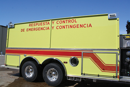 1 Pierce Manufacturing Inc. installed a 10-inch round side dump on each side of this tanker built for a South American fire department, along with a 10-inch rear dump. (Photo courtesy of Pierce Manufacturing Inc