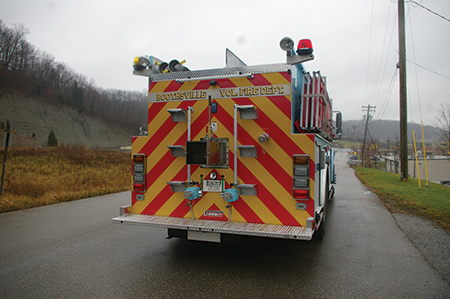 5 The Boothsville (WV) Volunteer Fire Department had Summit Fire Apparatus install a 10-inch square rear dump valve with a three-foot extension and two 2½-inch intakes on the back of its tanker. (Photo courtesy of Summit Fire Apparatus.)