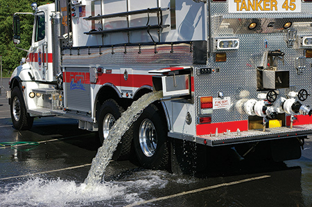 Summit Fire Apparatus put three 10-inch square dump valves on this tanker, one on each side behind the dual rear axles and one at the rear of the vehicle. (Photo courtesy of Summit Fire Apparatus