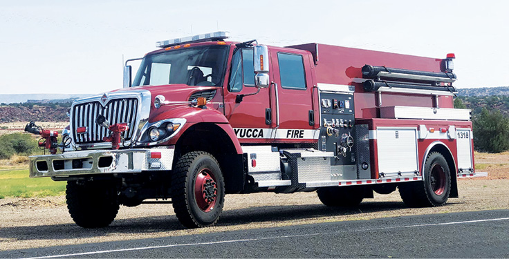 Custom Fab & Body—Yucca (AZ) Volunteer Fire District pumper-tanker. International 7500 cab and chassis; Cummins L9 380-hp engine; Darley KSP 1,000-gpm PTO pump; UPF Poly 2,000-gallon tank; 30-gallon foam cell; FoamPro 2001 Class A foam system; two Akron Fire Fox front bumper monitors; Newton electric rear dump valve with swivel chute. Dealer: Bill Hutchins, Arizona Fire Apparatus, Chandler, AZ