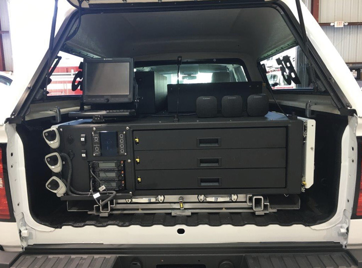 Virginia Beach (VA) Fire Rescue had E-ONE build a battalion command vehicle on a Ford F-550 four-door chassis with a slide-out tray at the rear holding all the command and control equipment.