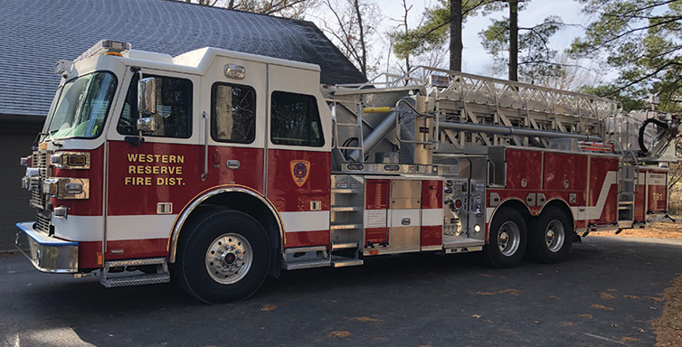 Sutphen—Western Reserve Joint Fire District, Poland, OH, SPH 100 aerial platform quint. Monarch cab and chassis; Cummins ISX12 500-hp engine; Waterous CSU 1,500-gpm pump; UPF Poly 300-gallon tank; Smart Power 10-kW generator; Stainless-steel body and subframe construction; Whelen LED warning lights; built in parapet ladder and Stokes basket storage on platform. Dealer: Ray Capezzuto, Herb Fire Equipment, Powell, OH.