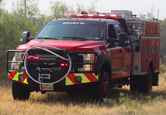 BFX Fire Apparatus built this Type 6 wildland engine for the Burkburnett (TX) Fire Department. Note the front discharge and road spray discharges on the front of the rig.