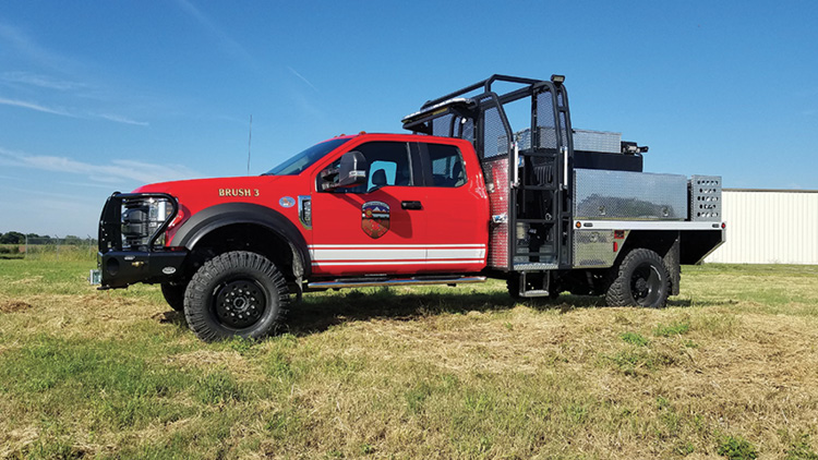 Unruh Fire built this Type 6 wildland pumper for the Pueblo (CO) Fire Department on a Ford F-550 4x4 Super cab and chassis with a lifted suspension and Super Single wheels and tires. 