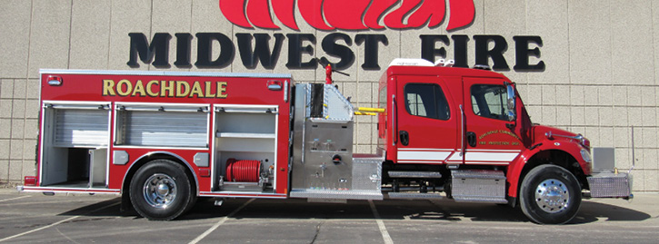 A pumper with a top-mount pump operator’s panel and a four-door commercial chassis.