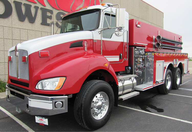 This two-door Kenworth tandem-chassis tanker-pumper has the forward portion of the tank notched over the pump module.