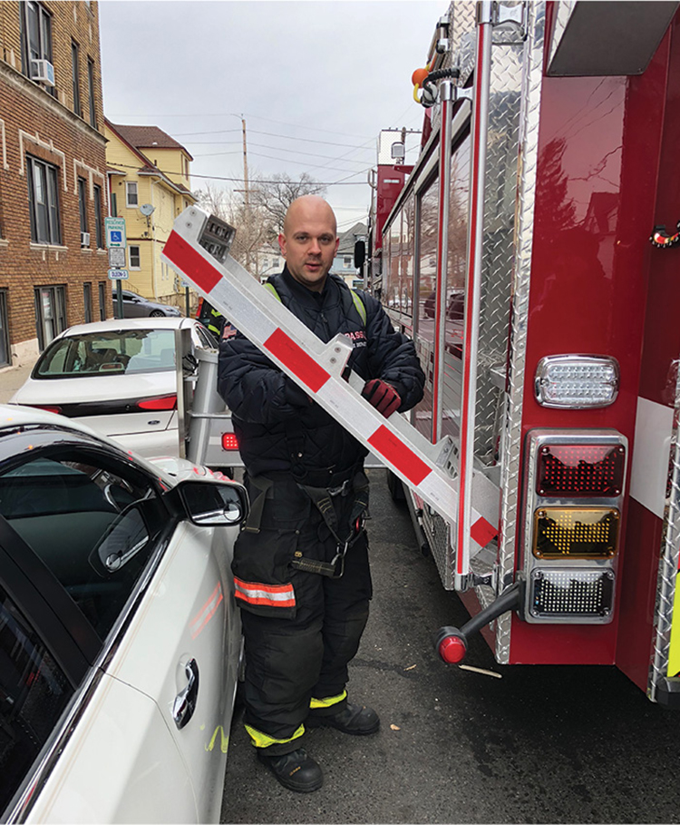 This hinged access ladder will not fully deploy because of the parked car. Luckily, there are other access ladders on the apparatus to reach the bucket; this is something apparatus committees should consider. (Photos by author unless otherwise noted.) 