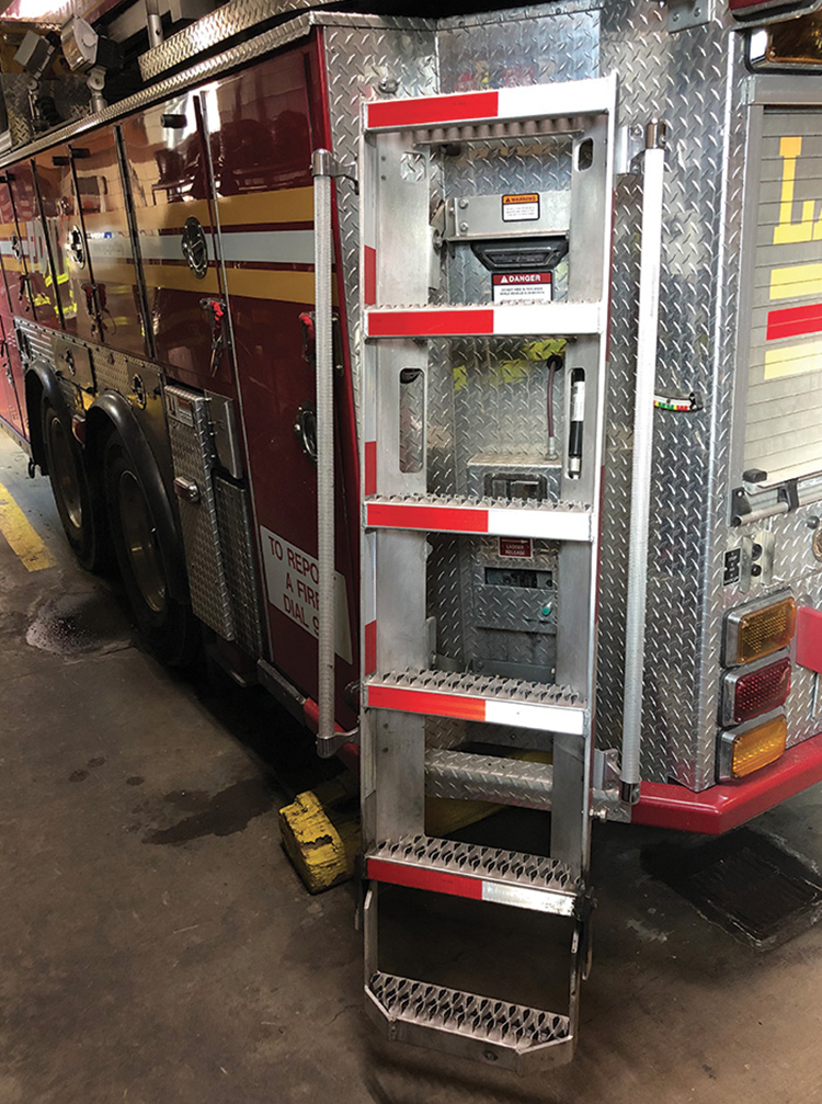 The FDNY’s Ferrara access ladder in the down position with lower step deployed. 