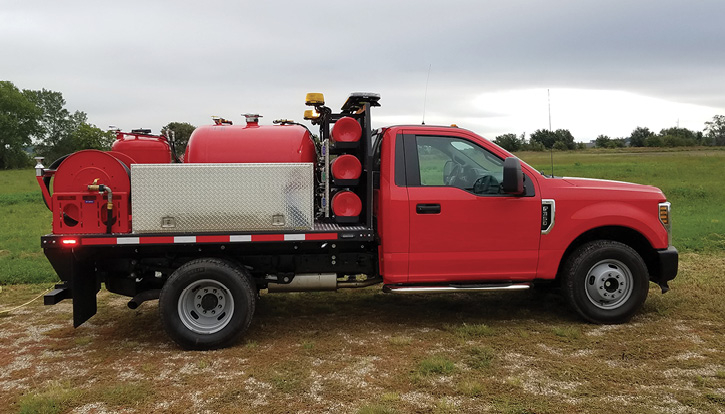 Unruh Fire built this small ARFF rig for the Liberal (KS) Fire Department, which covers a local airport, on a Ford F-350 chassis and nine-foot custom-built flatbed carrying 500 pounds of dry chemical, a TRI-MAX TM5200 CAFS unit with 200 gallons of premix, and a twin-agent hose reel. (Photos 1-3 courtesy of Unruh Fire.)