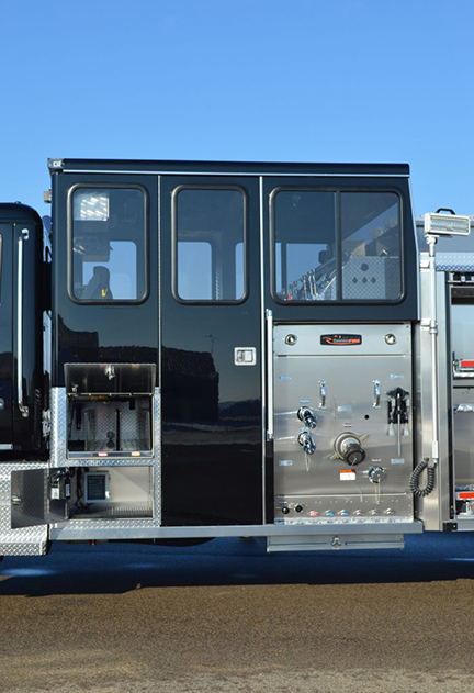 The pumper’s top-mount enclosed pump panel. 