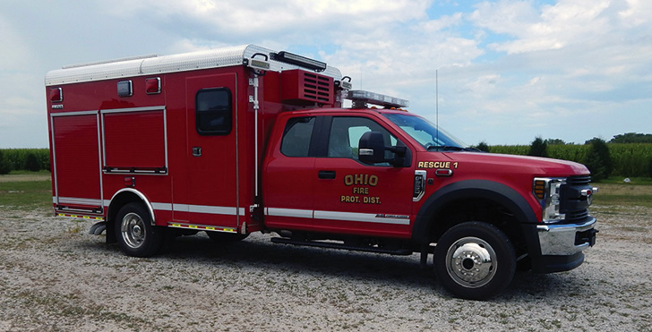 Alexis—Ohio (IL) Fire Protection District, Response One squad with 12-foot walk-in body. Ford F-550 XL 4×4 Super Cab DRW cab and chassis; Ford Power Stroke 6.7L 330-hp diesel engine; heavy-duty aluminum body; walk-in EMS in forward area with right side walk-in door and windows; two drop-down squad bench seats; interior squad area; two upper storage compartments. Dealer: Jon Pittard, Alexis Fire Equipment, Alexis, IL.