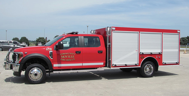 Danko—Moville (IA) Fire & Rescue 12.8-foot walk-around rescue. Ford F-550 Crew Cab and chassis; 6.8L 3 valve SOHC EFI 288-hp engine; Fab Fours black steel bumper replacement; ROM roll-up compartment doors; Whelen LED lighting. Dealer: Hayden Boeke, Danko Emergency Equipment, Snyder, NE.