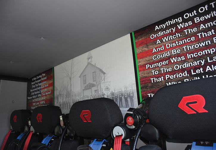 The historical mural found on the rear wall of each cab.