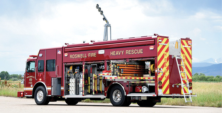 SVI Trucks—Roswell (GA) Fire Rescue heavy rescue. Sutphen Monarch cab and chassis; Cummins X12 500-hp engine; 22-foot partial walk-in rescue body; Command Light Knight 2 series light tower with 6 Pioneer Plus LED lights; Onan 15-kW generator; Carefree Mirage patio awning; OnScene Solutions heavy-duty cargo slides, Resolve Space Saver fill station. Dealer: Williams Fire Apparatus, Ashland, AL.