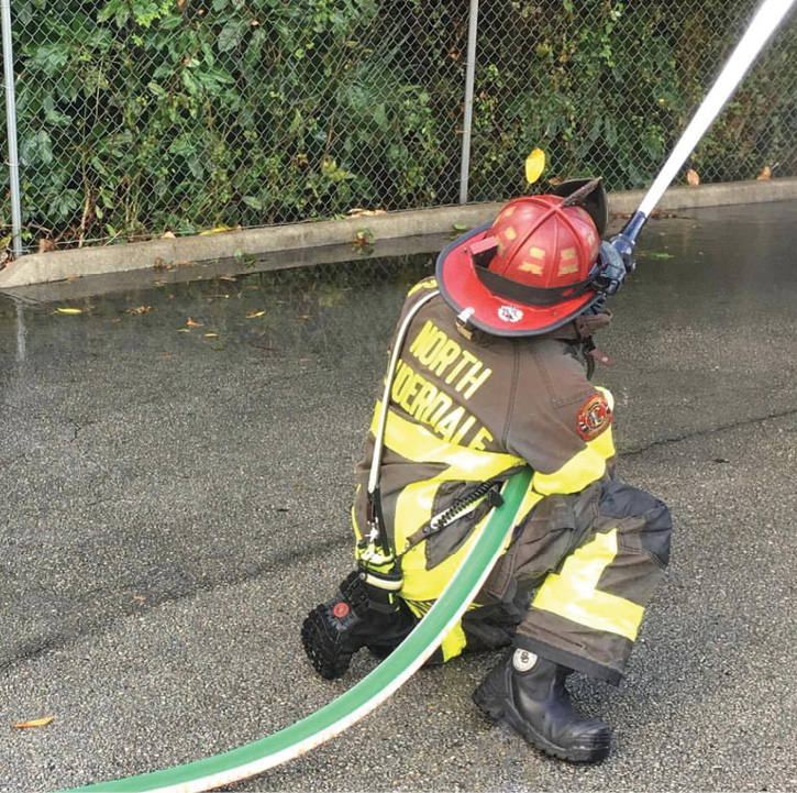 A firefighter wears Black Diamond X2 leather structural firefighting boots during a hose training exercise. (Photo 10 courtesy of Carhartt Footwear/Black Diamond Group.)