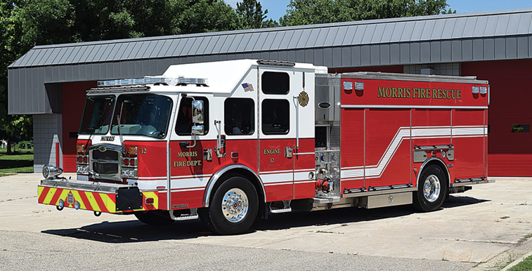 E-ONE—Morris (MN) Fire department eMAX pumper. Typhoon cab and chassis; Cummins L9 450-hp engine; Waterous CSX 1,500-gpm pump; 750-gallon polypropylene water tank; 30-gallon foam cell; FoamPro 2001 single-agent foam system; Smart Power 10-kW generator; Will-Burt Night Scan light tower with four Whelen Pioneer LED light heads. Dealer: Kim Clarey, Fire Safety USA, Rochester, MN. (Photo by Paul Barrett.)