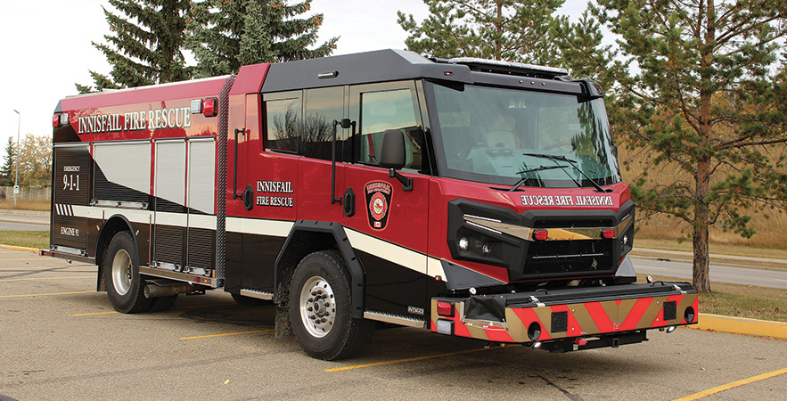 Rosenbauer—Innisfail Fire Rescue, Innisfail, Alberta, Canada, pumper. Avenger cab and chassis; Cummins L9 450-hp engine; Rosenbauer N 1,250-gpm pump; UPF Poly 1,000-gallon water tank; 100-gallon foam cell; FRC Turbo Foam single-agent foam system; Rosenbauer EZ Climb rear ladder. Dealer: Rocky Mountain Phoenix, Red Deer, Alberta.