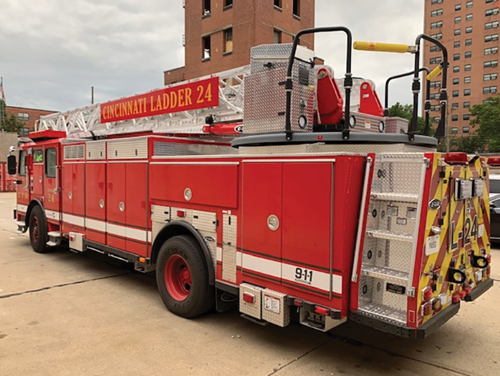 The rear of the E-ONE Metro 100 aerial ladder has a rear staircase module narrower than the main body to help reduce tail swing.