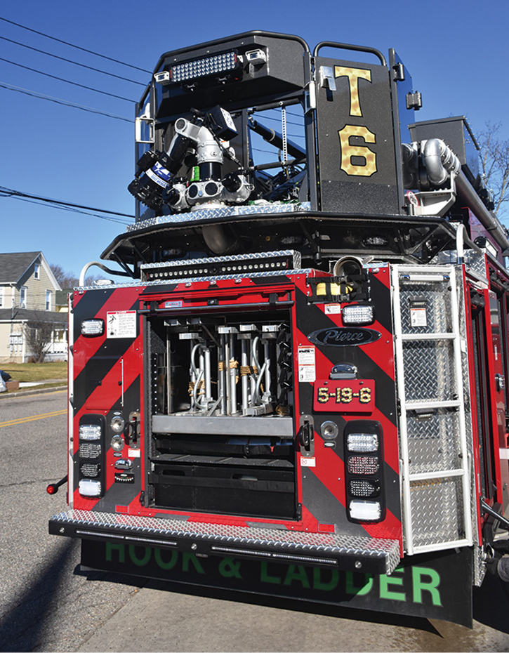 Rear ladder storage and a single TFT Monsoon deck gun attached to bucket.