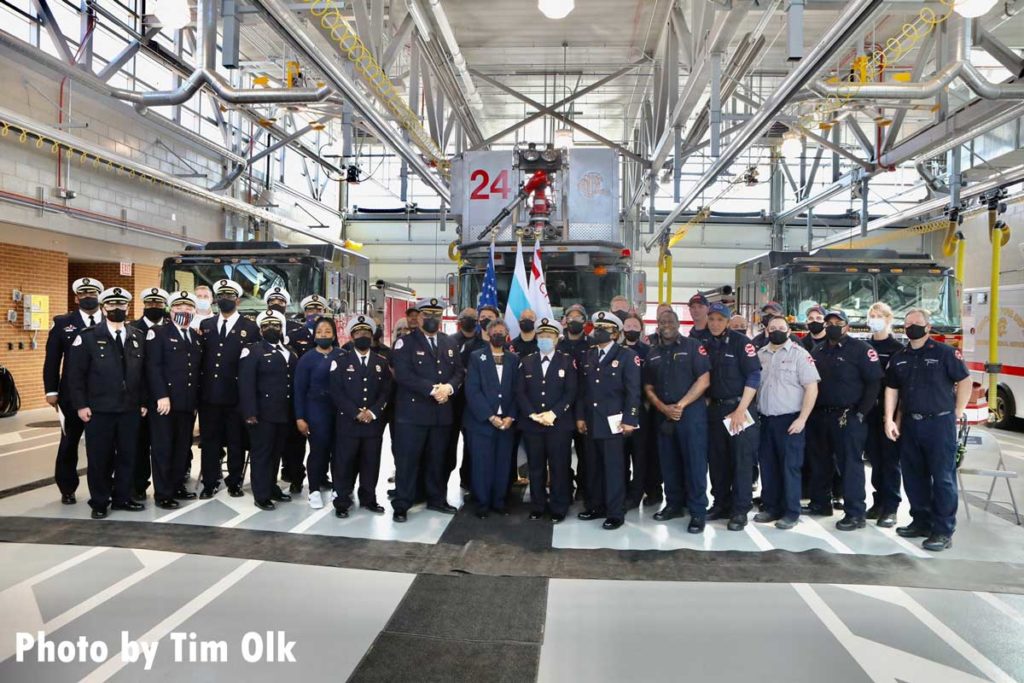 Chicago fire officials and dignitaries at ribbon cutting for Chicago Fire Department Engine Company 115